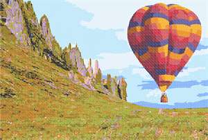 image of Hot Air Balloon Over Valley