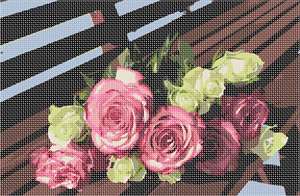 A bouquet of roses on a park bench