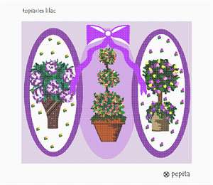 A trio of topiaries garnished with ribbons in lilac colors.