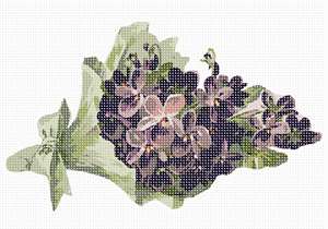A bundle of purple flowers wrapped in green paper.