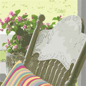 Relax with this rocking chair and floral arrangement