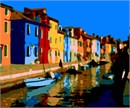 Brightly-painted houses along the Venetian Lagoon in the small city of Burano.