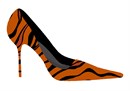A leopard needlepoint high heel shoe.  Stitch a coordinating pocketbook purse in leopard too.