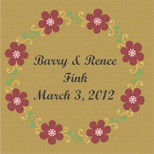 The name of the joyous couple with their anniversary date, wreathed in red flowers.